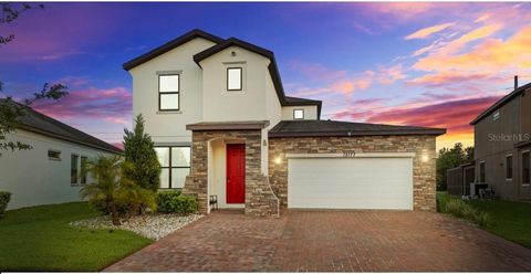 Photo of 12177 Northover Loop, Orlando, FL 32824 (MLS # O6342949)