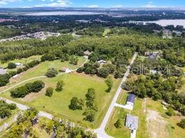 Rare opportunity to own 6.33 acres in the rapidly growing Narcoossee Corridor of St. Cloud. This property has access from 2 roads Shepherd ave, and Carson street, and can potentially be combined with another 5.33 acre lot that borders Moore Street (see listing number O6330036). This lot includes a 3 bedroom, 2 bath manufactured home built in 1984, that has been kept in great shape, ideal for rental income or use during development, or during construction of a custom home, and a metal barn. Currently zoned AC in the Eastern portion on the land and R-2 on the West 2 acre lot, the property holds a Future Land Use designation of Low Density Residential, and the county has suggested rezoning to Urban Fringe, which would allow up to two homes per acre. This makes it an excellent candidate for a custom home community or large-lot residential development. Located just minutes from Lake Nona’s Medical City and surrounded by new growth, this parcel is perfect for builders, investors, or families seeking space and long-term opportunity in a high-demand area. Why buy a 0 lot property in Lake Nona when you can have your own private oasis in the middle of the city?. This lots offers a strong foundation for long-term investment. Located just minutes from Lake Nona’s Medical City and surrounded by new growth, this parcel is perfect for builders, investors, or anyone looking for space and opportunity in a high-demand area.