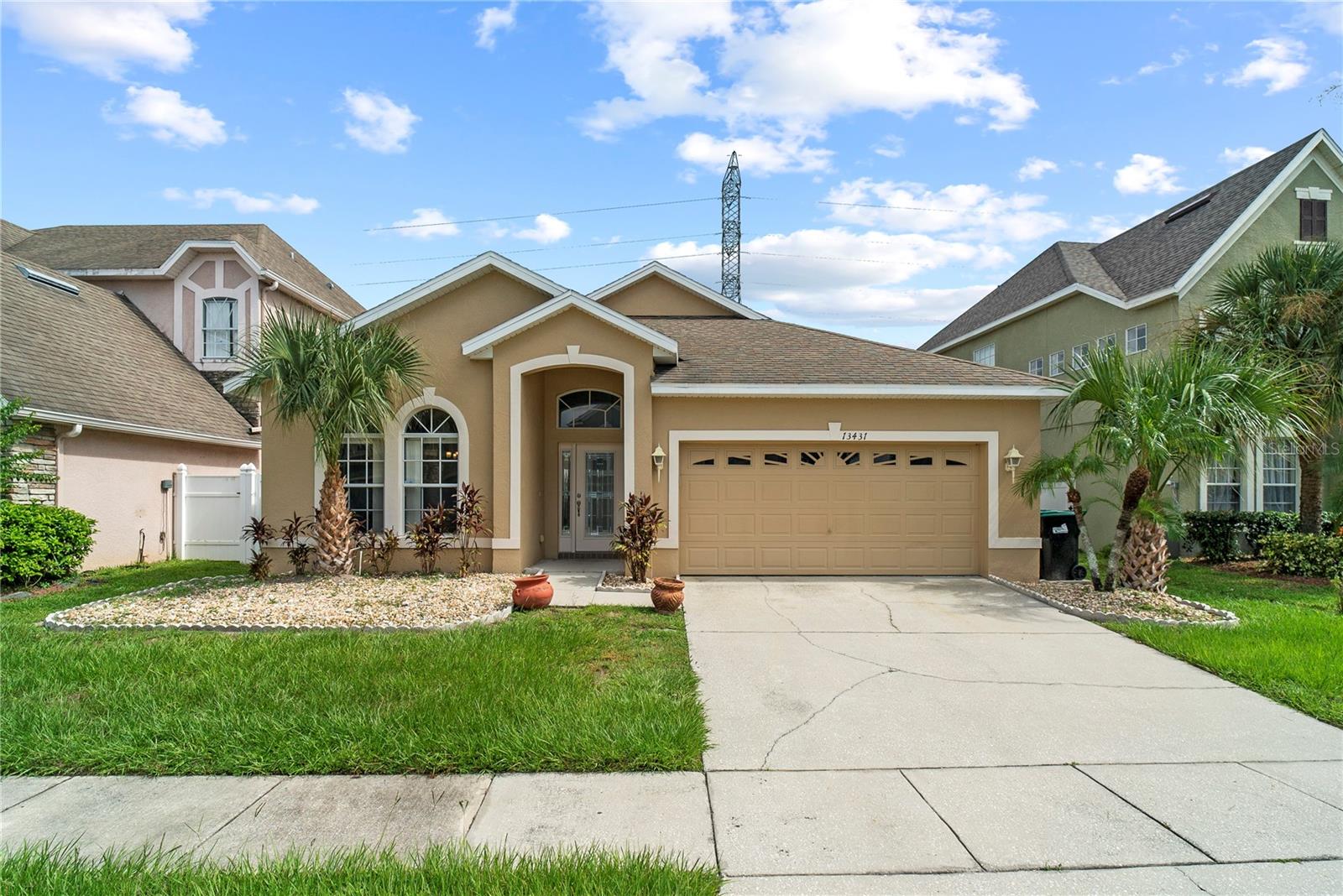 One or more photo(s) has been virtually staged. Welcome to 13431 Meadow Bay Loop-a freshly remodeled 4-bedroom, 2-bathroom home located in a quiet gated community in the heart of Meadow Woods, Orlando. This light and bright home features soaring vaulted ceilings, luxury vinyl plank flooring, and an open-concept layout perfect for both everyday living and entertaining. The kitchen has been beautifully updated with brand-new stainless steel appliances, modern countertops, and ample cabinet space. The split floor plan provides privacy, while the spacious primary suite offers a peaceful retreat. Enjoy the Florida lifestyle from your spacious backyard. Tucked in a well-maintained gated neighborhood, you're just minutes from Lake Nona, the Orlando International Airport, Medical City, major highways like 417 and the Turnpike, and popular shopping and dining at The Loop and Boxi Park. With its modern upgrades and unbeatable location, this 1move-in ready home offers the perfect blend of style, comfort, and convenience. Don't miss your chance to see it!
