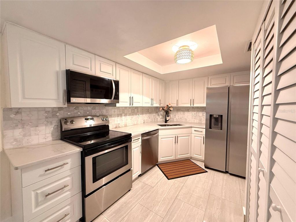 Photo of 2363 Flanders Way #D, Safety Harbor, FL 34695 (MLS # TB8527932)