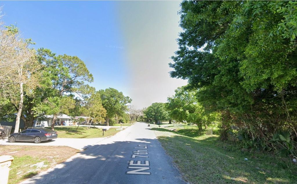 Photo of 6640 NE 7th Lane, Okeechobee, FL 34974 (MLS # OK225769)
