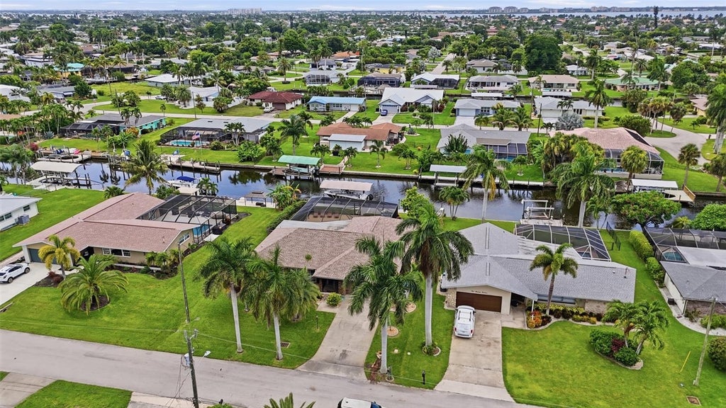 Photo of 418 Avalon Drive, Cape Coral, FL 33904 (MLS # TB8536965)