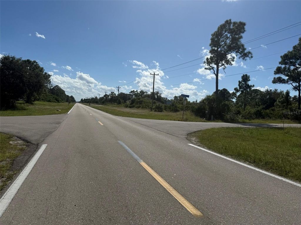 Photo of 627 Columbus Boulevard S, Lehigh Acres, FL 33974 (MLS # OK225646)