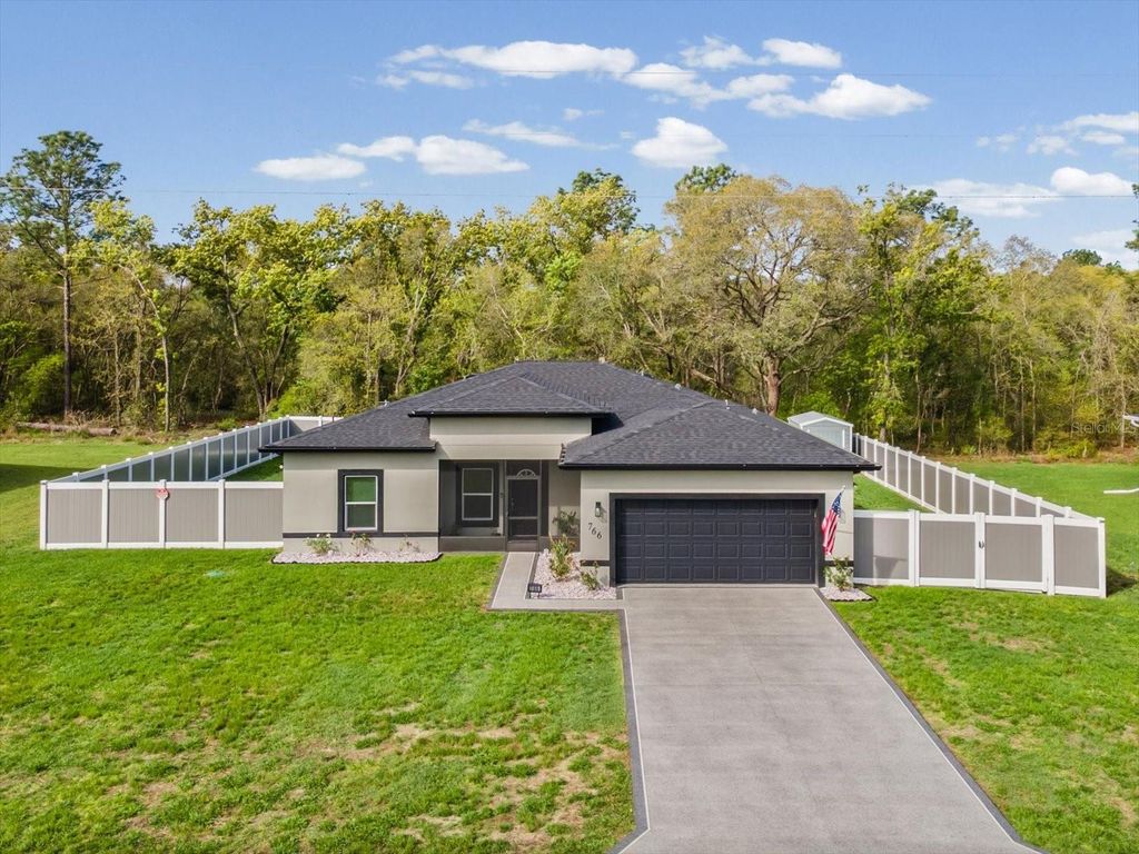 Photo of 766 Marion Oaks Manor, Ocala, FL 34473 (MLS # W7884708)