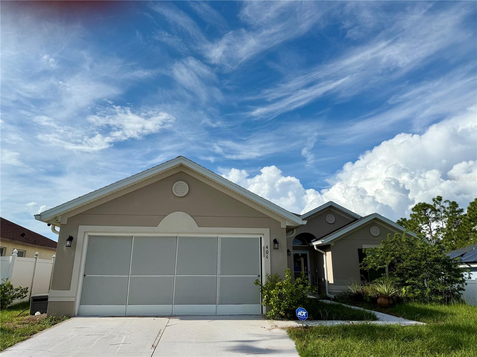 Welcome to Your Dream Home in Poinciana, Florida!
This beautifully maintained 4-bedroom, 2-bath single-family home is packed with features designed for comfort, convenience, and Florida living at its best. Offering a handicap-accessible entrance with a ramp, this home ensures accessibility for all.
Step inside and you’ll immediately be drawn to the open-concept living space, highlighted by tile flooring, soaring ceilings, and abundant natural light that creates a warm, inviting atmosphere. The spacious kitchen is a true centerpiece, boasting stainless steel appliances, a built-in pantry, a kitchen island, and brand-new granite countertops—perfect for both daily meals and entertaining.
The master suite is a private retreat, featuring dual vanities, a garden tub, a separate shower, and a walk-in closet. This home has been thoughtfully upgraded with hurricane-rated easy-clean windows, a screened-in patio, rain gutters, upscale faucets, wiring for a whole-house generator, and a comprehensive exterior camera/alarm system. A brand-new roof (January 2025) offers peace of mind, while leased solar panels ($124/month) keep energy bills low.
The garage with tiled flooring and a retractable privacy screen provides both functionality and comfort. Outdoors, you’ll love the variety of tropical fruit trees flourishing in the front and backyard—perfect for enjoying fresh-picked treats all year long.
Located in a vibrant community, residents enjoy access to 11 parks, a fitness center, an aquatic center, and a resort-style pool. Plus, the affordable HOA fee of $90/month includes cable and internet.
Don’t miss this opportunity to own a home that blends modern upgrades, thoughtful accessibility, and the best of Florida living. Schedule your private showing today!