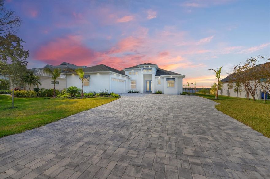 One or more photo(s) has been virtually staged. (Furniture Only has been staged). Luxury waterfront living in Ormond Beach - Discover a rare opportunity to own a newly constructed waterfront home on the highly coveted Intracoastal Waterway. Nestled off a private side street on prestigious John Anderson Drive, this home offers the perfect blend of modern elegance and serene privacy. Designed and built in 2024 by the renowned Niagara Builders Inc., led by Sal Iamarino, this property boasts exceptional craftsmanship and meticulous attention to detail. Situated on a spacious 1/3-acre lot just 2.5 miles from Granada Bridge, you'll enjoy convenient access to premier dining, boutiques and entertainment. This stunning residence features: bright, open floor plan, 4 bedrooms plus office, with soaring 12-foot, 7-inch ceilings in the great room and primary suite. Expansive outdoor living: oversized covered lanai (17-by-52 feet), a sparkling in-ground pool by Blue Water Pools, wrought iron fencing, and a new dock with an electric boat lift and seawall. Gourmet kitchen: quartz countertops, expansive breakfast bar, full appliance package, inside laundry with splash tub, crown molding, sound proofing insulation batts throughout wood-framed walls in bedrooms and baths. Superior construction: concrete block with a stem wall foundation, double-pane hurricane-impact windows, Rain Bird sprinkler system and engineered wood flooring with tile in baths. Energy-efficiency: Noritz tankless hot water heater, advanced insulation, Carrier AC system and a new aerobic septic system. Garage space galore: oversized 624 square-foot garage for all your storage and parking needs. Outdoor amenities: in-ground pool by Blue Water Pools, new dock with boat lift, built-in grill and sink for alfresco dining and entertaining. Just 100 feet to the Intracoastal channel. This home features modern building codes, energy-efficient systems and materials, making this property as practical as it is beautiful. Don't miss this rare chance to own a brand-new Intracoastal dream home in sought-after Ormond Beach. Schedule your private showing today and experience waterfront living at its finest!