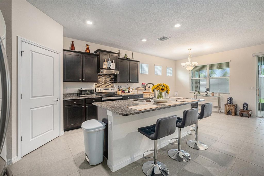 Photo of 8040 Wheat Stone Drive, Zephyrhills, FL 33540 (MLS # TB8427284)