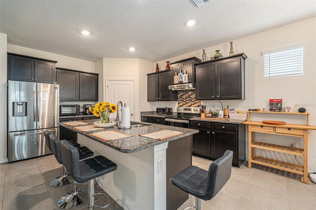 Photo of 8040 Wheat Stone Drive, Zephyrhills, FL 33540 (MLS # TB8427284)
