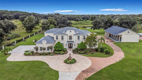 Photo of 32632 Tyndall Road, Wesley Chapel, FL 33545 (MLS # TB8554848)