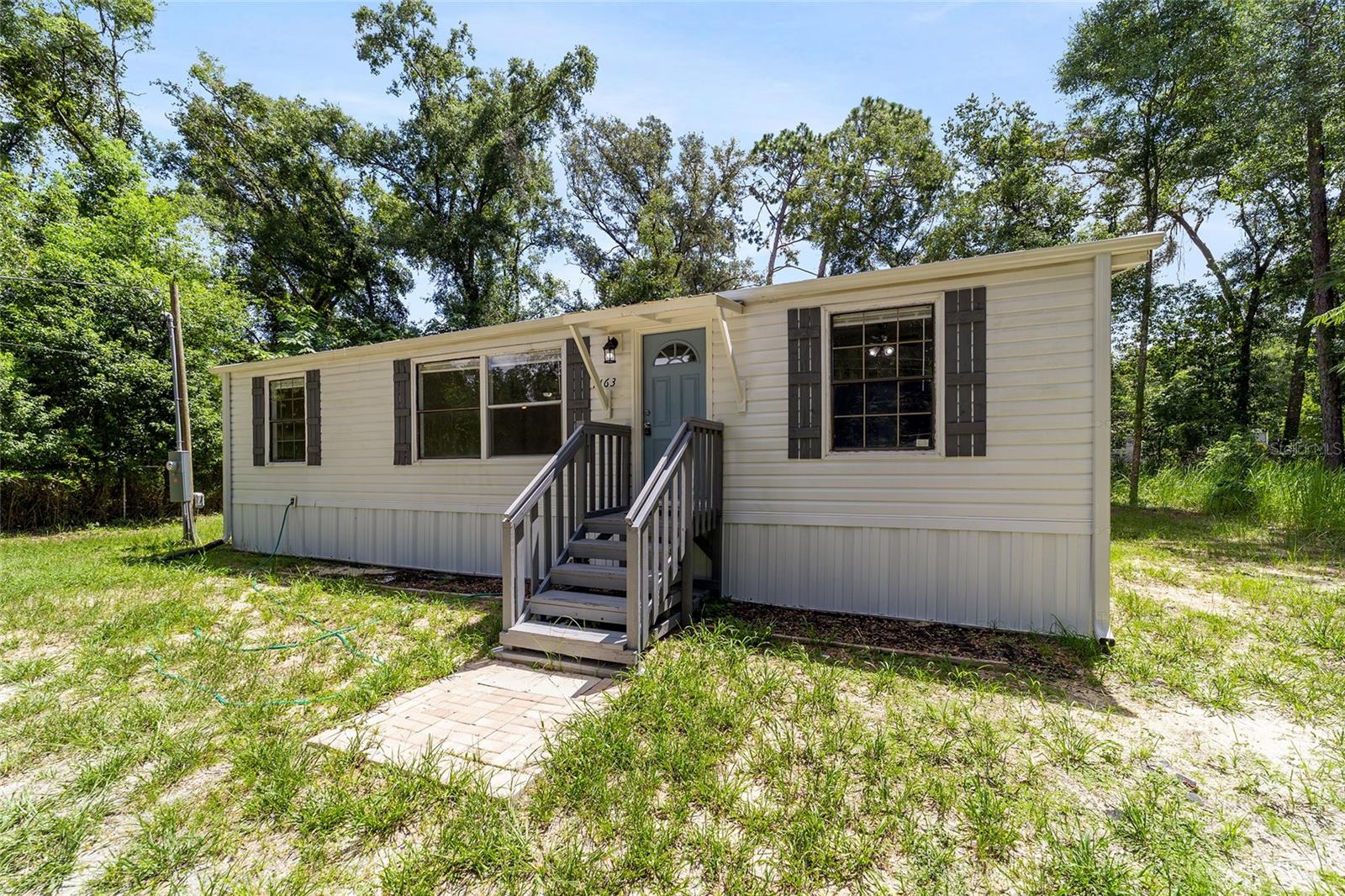 Short Sale. Great 1st time homebuyer or investor opportunity. 3/2 manufactured home in NW Marion County, totally remodeled with new roof , new A/C water heater, flooring kitchen cabinets and bathrooms. Would make great rental property.