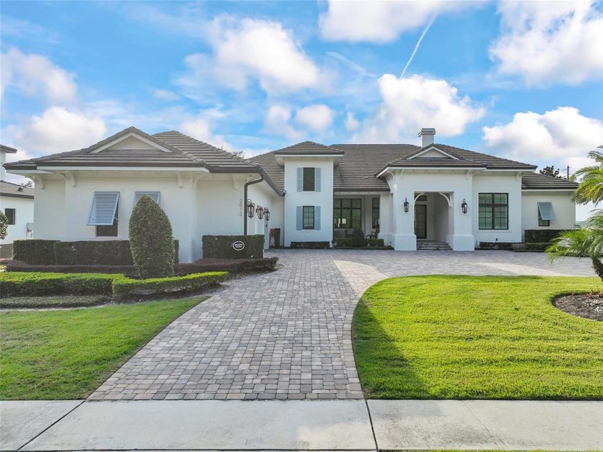 This fully furnished and former model home of beautiful Bella Vita Estates in Windermere will take your breath away. The property is loaded with tons of upgrades and is move in ready. Resort style pool, fireplace, custom automatic blinds, theater room, game room, yoga room and summer kitchen to host and entertain family and friends. This home is well appointed, and the developers made this home their show piece of the community.