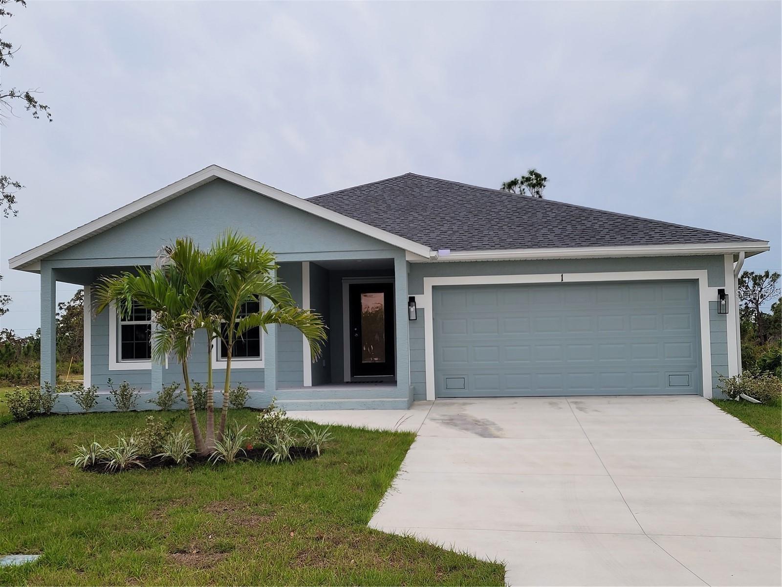 A BEAUTIFUL and welcoming home with a front porch to sit and relax on. As you enter the home, the grand hallway draws you in, bringing you to the expansive open floor plan living area and the screened in lanai beyond. Plank tile throughout. The kitchen has granite counters, closet pantry, stainless steel appliances, island with breakfast bar to sit 4, and pendant lights. Primary Bedroom's transom window gives you both the sunshine and the privacy, with tray ceiling and walk-in closet. The primary bath has double sinks and walk-in shower. All bedrooms have ceiling fans. Guest bath has a tub/shower combination. Separate laundry room equipped with washer and dryer.
