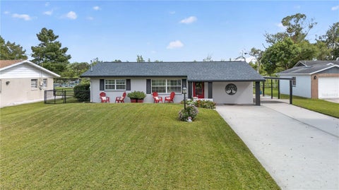Photo of 28050 Lois Drive, Tavares, FL 32778 (MLS # O6438235)