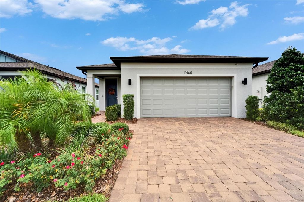 Photo of 19165 Iron Topsail Isle, Land O Lakes, FL 34638 (MLS # S5127925)