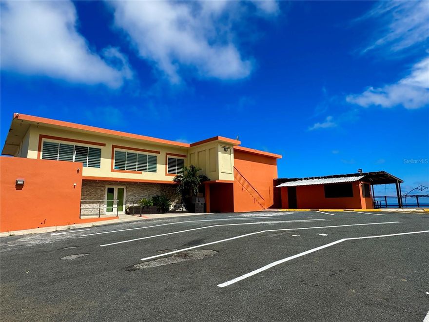 The El Horizonte restaurant is the most iconic restaurant located in the east Puerto Rico. Established for over 50 years on the scenic route, it boasts the best view of the Caribbean Sea. The restaurant is 8,300 square feet in size and, in addition to the restaurant, features a comfortable apartment with two bedrooms, a living room, kitchen, dining room, laundry room, and a terrace with stunning ocean views. The restaurant features a cocktail lounge, a bar, nine bathrooms, a kiosk with a terrace, 16 tables, over 100 chairs, 37 parking spaces, and includes a full inventory, including a walk-in freezer, a walk-in refrigerator for vegetables, walk-in cooler, a 5,000-gallon water cistern, a 21-KW industrial plant, large kitchen with industrial stove, 4-foot stovetop, dishwasher, industrial extractors, sandwich maker, 3 8-foot stainless steel tables (for food preparation), wine racks, 3-door refrigerator, frying display cases, and much more.