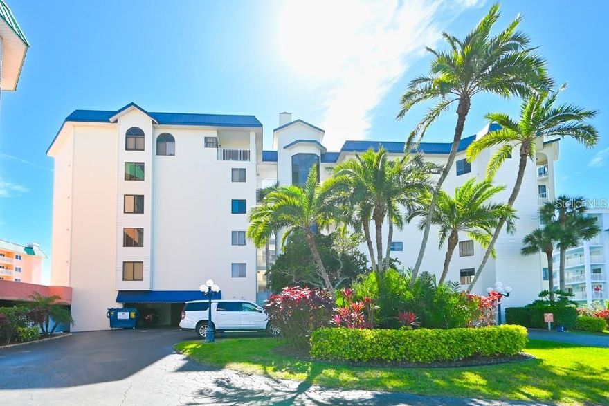 Beautifully updated 3 bedroom and 2 bath condo. This is the perfect beach getaway or income producing rental property, turn key and fully furnished(All Furnishings/Decorations Convey). The unit has an open kitchen/dining/living space with a split bedroom floor plan. Porcelain tile is laid throughout the living areas and there is tile in all bedrooms. The kitchen is fully updated with white shaker cabinets, soft close drawers/cabinets, and KitchenAid appliances along with quartz countertops. The Master Bedroom features an en-suite bathroom with dual sinks and walk-in closet. There is a view of the Gulf from the Master along with a door that leads out to the balcony. The 2nd bathroom has a walk-in shower to accompany the other 2 large bedrooms. This unit also offers a full-size washer/dryer w/ additional storage behind the coastal chic barn door. Beach Palms is located on the gorgeous Indian Shores Beach. It is conveniently located by Park Blvd bridge with easy access to groceries, shops, pubs, and boutiques. The complex offers a heated saltwater pool overlooking the beach. There are gas grills and showers/restrooms available as well. HOA includes: Common Area Taxes, Escrow Reserves Fund, Insurance, Maintenance Exterior, Landscaping, Maintenance Grounds, Manager, Pest Control, Pool Maintenance, Sprinkler system (inside condo) maintained by condo association, garbage/waste, and water provided. Units can be rented weekly, monthly or annually.