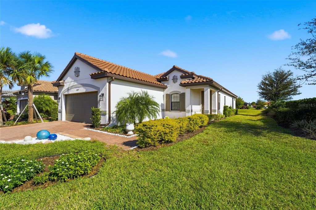 Photo of 11104 Devonbridge Drive, Palmetto, FL 34221 (MLS # A4677518)