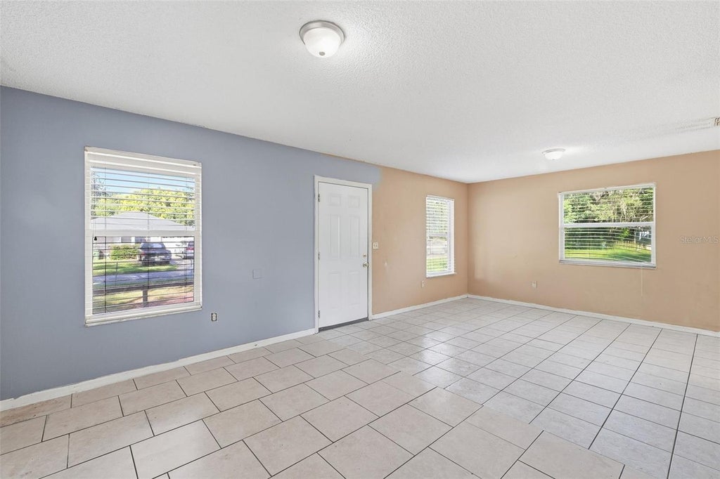 Photo of 902 Talladega Street, Leesburg, FL 34748 (MLS # G5118080)