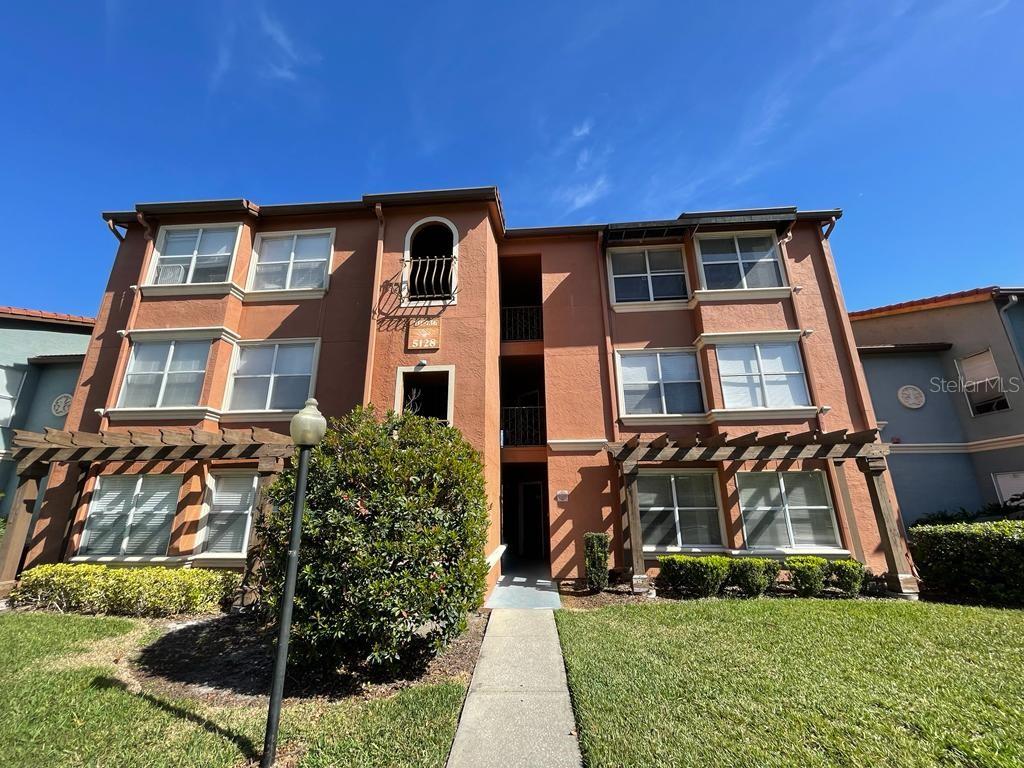 Beautiful 1-bedroom, 1-bath condo on the 3rd floor in the sought-after gated community of Residences at Villa Medici. This well-maintained unit features a fantastic pond view, laminate flooring in the living/dining areas, tile in the kitchen and bathroom, and carpet in the bedroom. The kitchen boasts granite countertops and stainless steel appliances, with a laundry closet that includes a washer and dryer for added convenience. Recent updates include a new A/C unit (2021) and a full repipe in 2024, providing leak-free peace of mind. Enjoy resort-style community amenities such as a swimming pool, hot tub, playground, lighted tennis court, BBQ and picnic area. A reserved parking spot is included. Prime location just one mile west of I-4 on Conroy Road, near the Mall at Millenia, with quick access to shopping, dining, and entertainment. Rent includes water, sewer, and garbage. Application fee: $75 per adult (non-refundable); association fee: $150 per adult (non-refundable). All adults must apply. Equal Housing Opportunity.