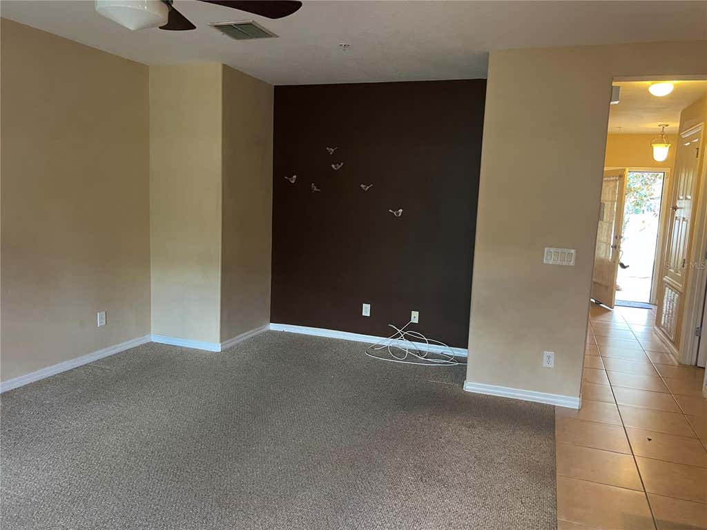 Photo of 9731 Biscotti Avenue, Orlando, FL 32829 (MLS # O6412173)