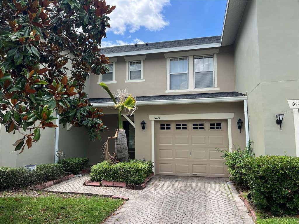 Photo of 9731 Biscotti Avenue, Orlando, FL 32829 (MLS # O6412173)