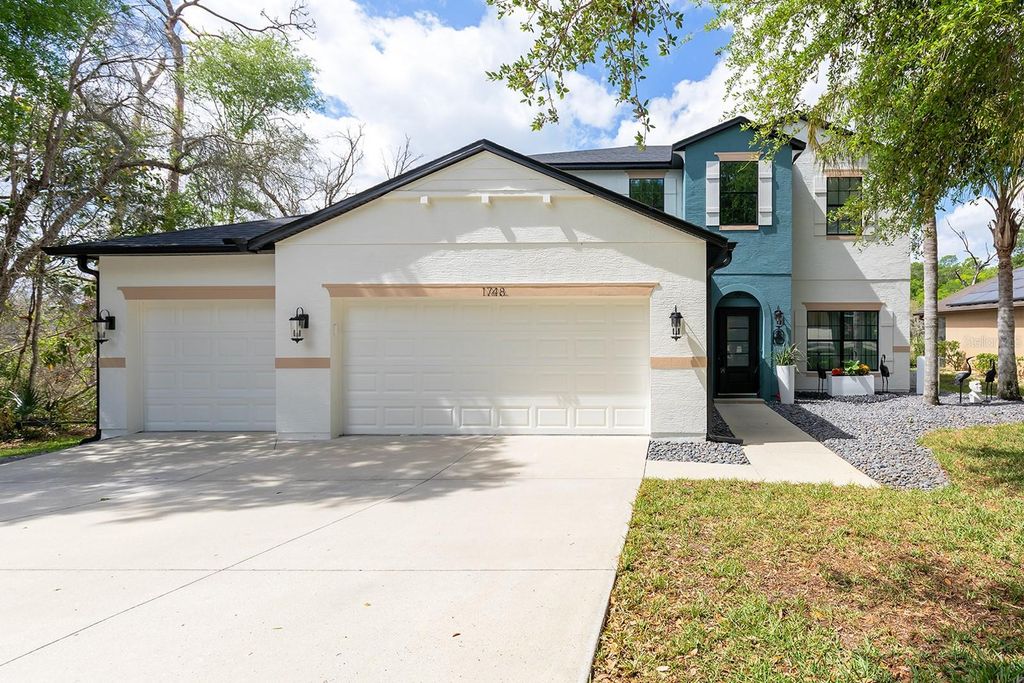 Photo of 1748 Waterside Oaks Drive, Orange City, FL 32763 (MLS # O6390977)