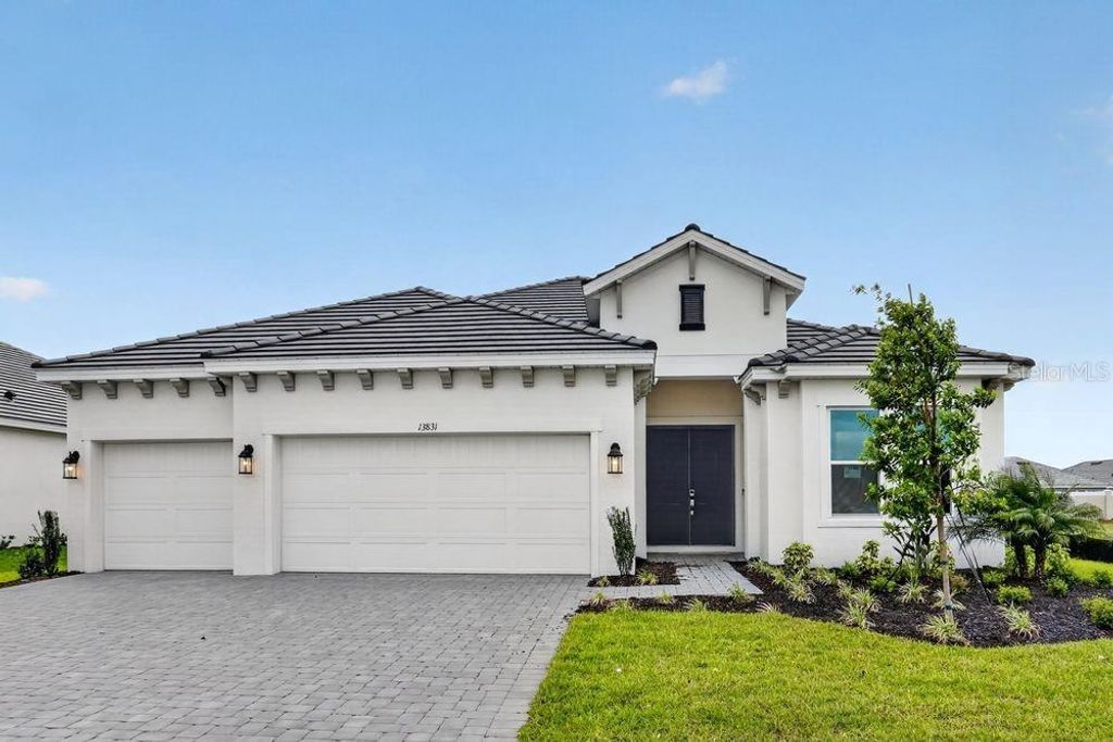 Photo of 13831 Buchanan Drive, Palmetto, FL 34221 (MLS # TB8489711)