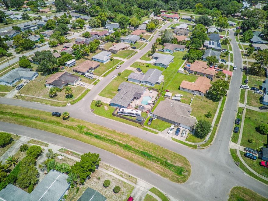 **Fresh New Price - Ready for the Weekend!  Live the VACATION LIFESTYLE – NO HOA!
MINUTES to the BEACHES, Cape Canaveral LAUNCHES, and all the BEST of the Space Coast! This beautifully UPDATED 4/2 POOL home sits on a spacious CORNER LOT with NO HOA and endless possibilities. PARK your RV, boat, or extra vehicles—there’s plenty of SPACE to park, and the fully FENCED yard offers privacy and security. TWO STORAGE SHEDS provide even more room for tools, toys, or hobbies.
Inside, you'll love the OPEN-concept floor plan, featuring a generous kitchen with a large INSIDE LAUNDRY room and comfortable living spaces that flow effortlessly for entertaining. The 4th bedroom is PRIVATELY SITUATED—ideal for a teen, in-law, or guest suite. A versatile DEN or OFFICE opens via sliding doors to the SCREENED LANAI with a TV and open-air 13,000 gallon POOL, giving this home a true VACATION VIBE. 
RECENT UPDATES INCLUDE:
• 2020: ROOF, A/C & furnace, hot water heater, dishwasher, garbage disposal
• 2021: Pool pump & heater, blown-in attic insulation
• 2022: Rebuilt screen porch, front and back patio PAVERS, 3-stage WATER PURIFIER
• 2025: Underground fiber internet connection, refrigerator, stove
ALL KITCHEN APPLIANCES PLUS washer & dryer are included. Lawn mowers, garage refrigerator, and workbench in garage are NEGOTIABLE.
A VERY LARGE 2-car garage, mature landscaping, and CONVENIENT location close to shopping, dining, and major routes complete the package.
Enjoy comfort, freedom, and space—with ALL the BIG-TICKET items already DONE. Come experience the BEST of Titusville living!  Coquina Elementary School - Andrew Jackson Middle School - Titusville High School