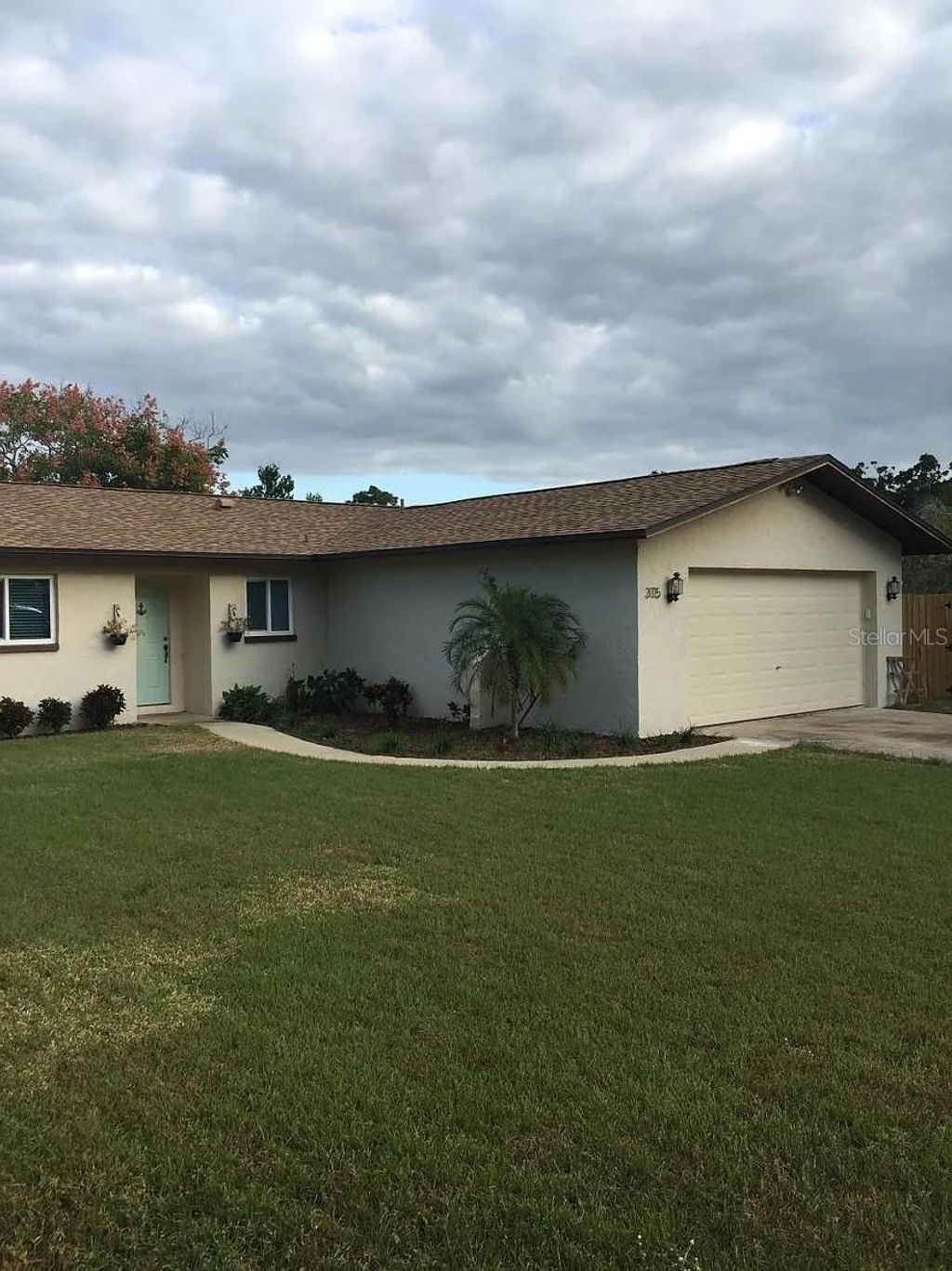 Photo of 3115 Winchester Drive, Dunedin, FL 34698 (MLS # TB8465144)