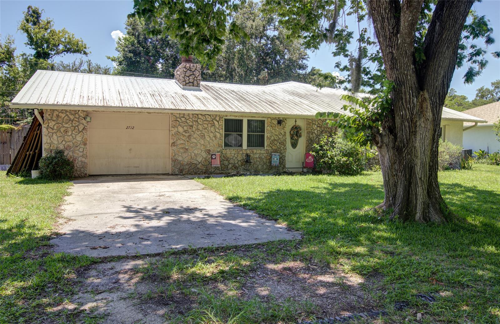 Location Location Location with only 15 minutes to the beach and 10 to boat docks on the InterCoastal. Enjoy the luxury of having 2 Master Suites, a Living Room with Fireplace, a Family Room with Vaulted Ceiling, and ceiling fans throughout, and all this under a new metal roof (2019). Large screened-in back porch, above-ground pool (14x42), and fenced yard for plenty of privacy. This property sits in a well-established area on a double lot. Schedule your showing today. All information recorded in the MLS is intended to be accurate, but cannot be guaranteed. ;Water: City