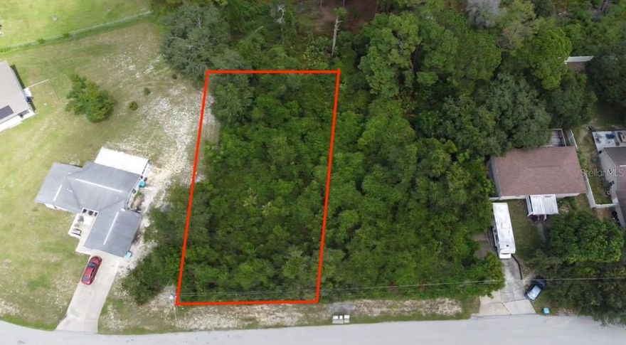 Build your dream home on this vacant lot tucked in a quiet residential neighborhood! Enjoy peace and privacy while still being close to everything—restaurants, hospitals, and shops are just minutes away, with quick access to I-4 for an easy commute. Only 30 minutes to New Smyrna Beach, this property offers the perfect balance of convenience and lifestyle. Great opportunity for a custom build or investment in a growing area. Adjacent lot at 1849 Bonkirk Drive is also available for purchase
