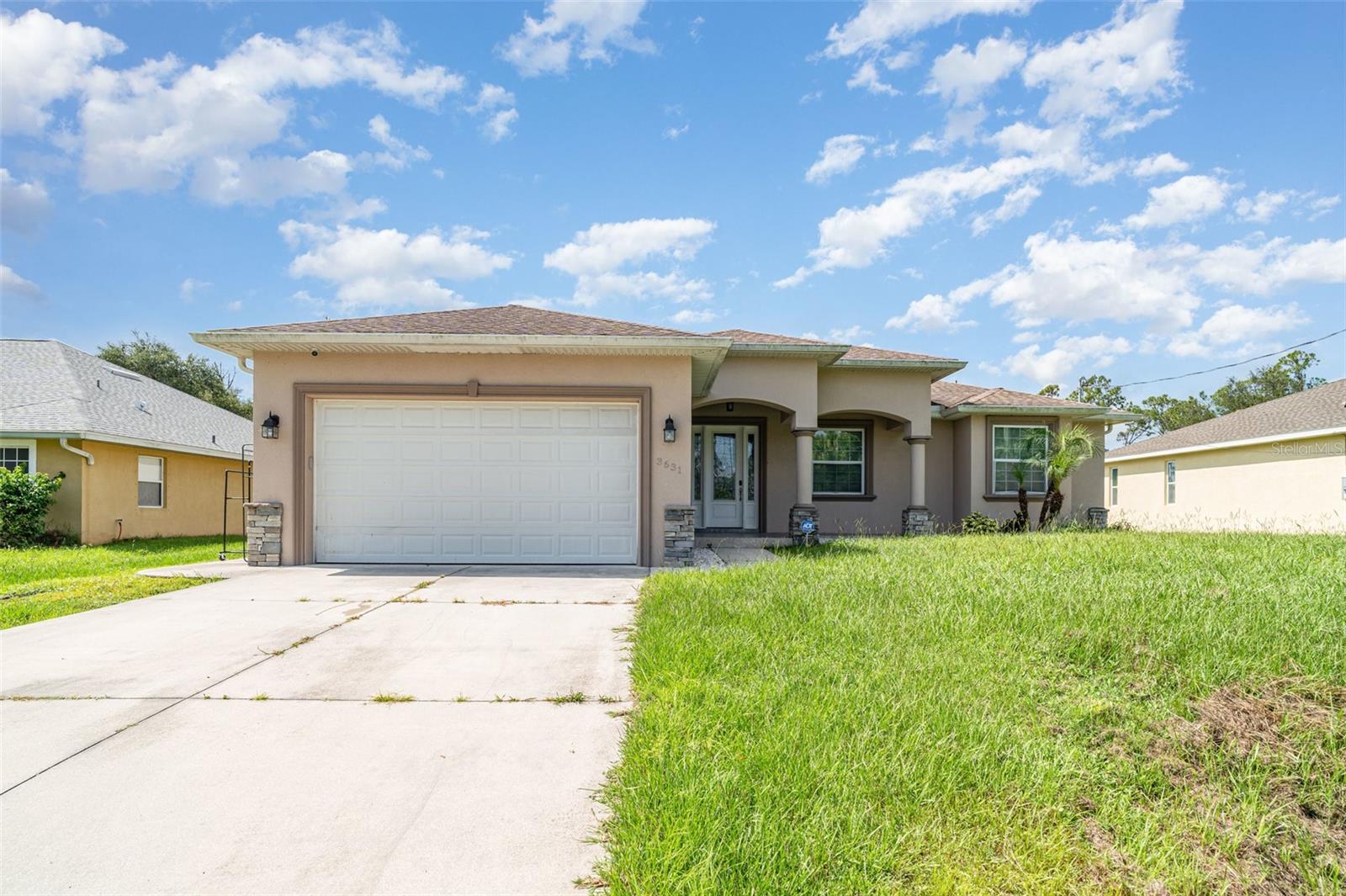 Prepare to be amazed by this stunning brand new, custom-built 3-bedroom, 2-bath home with a 2-car garage, ideally located in the highly desirable North Port area! As you arrive, you're welcomed by tropical landscaping, stone accents, an open front porch, and architectural pillars that create a truly grand entrance. Step through the double etched glass doors into a light-filled open-concept great room featuring soaring ceilings, elegant 24x24 ceramic tile flooring, coffered ceilings, a cozy reading nook, and sliding glass doors leading to the private screened-in lanai. The kitchen boasts bi-level crowned cabinetry, tile backsplash, a wall-mounted pot filler, stainless steel appliances, custom range hood, granite countertops, a farmhouse sink, breakfast bar, closet pantry, and a low bar island complete with a built-in wine refrigerator and microwave. Retreat to the spacious master suite, which includes an oversized walk-in closet and direct access to the lanai. The luxurious master bathroom offers dual sinks, a tiled walk-in shower with granite bench seat and dual entrances, a make-up vanity, a jetted garden tub, and a private toilet stall—designed for ultimate comfort and relaxation. The split bedroom floor plan ensures privacy for family and guests alike.
This home is packed with custom upgrades, including:
High-impact windows and sliders
Granite windowsills
Designer light fixtures
Stylish paneled doors