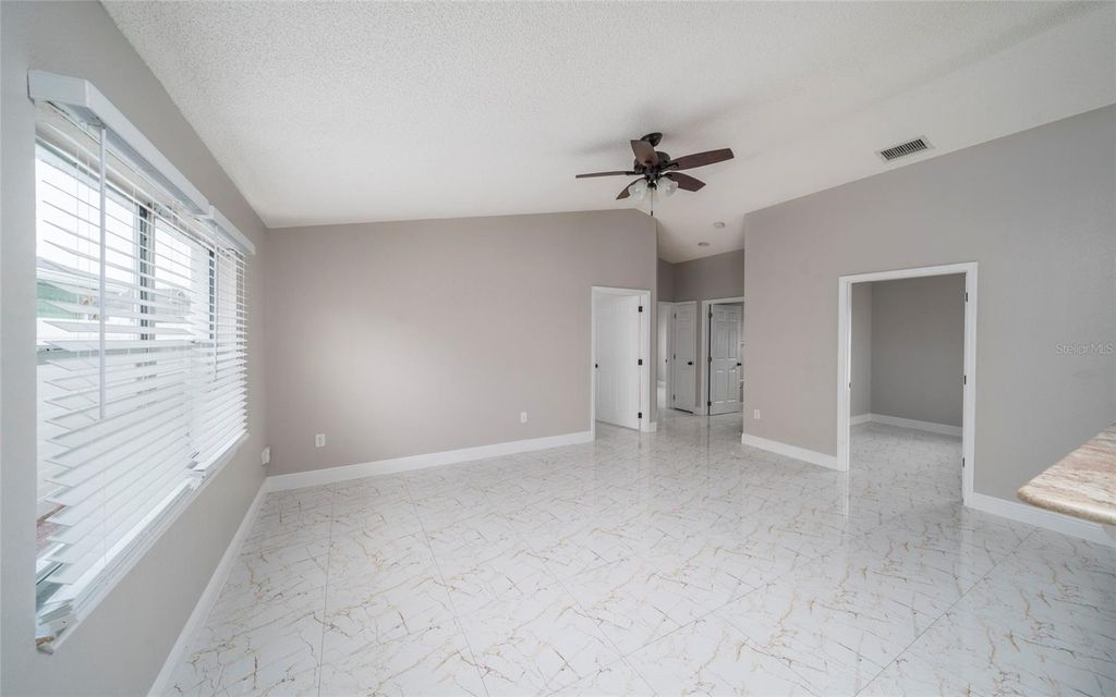 Photo of 10201 Vista Cove Lane, Orlando, FL 32825 (MLS # O6379602)