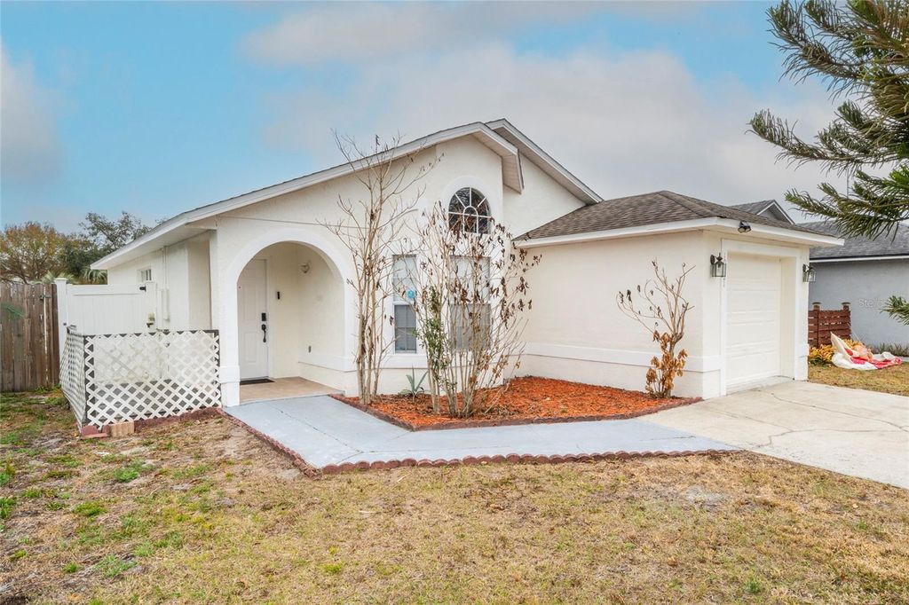 Photo of 10201 Vista Cove Lane, Orlando, FL 32825 (MLS # O6379602)