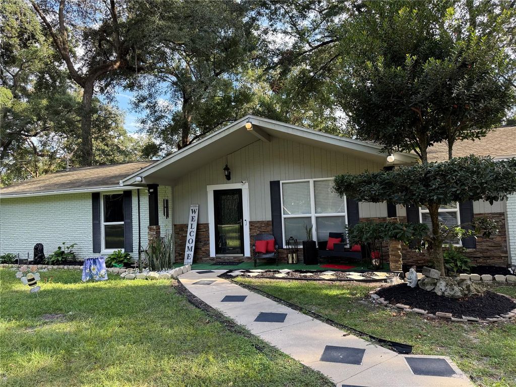 Photo of 7713 SW 8th Avenue, Gainesville, FL 32607 (MLS # GC533837)