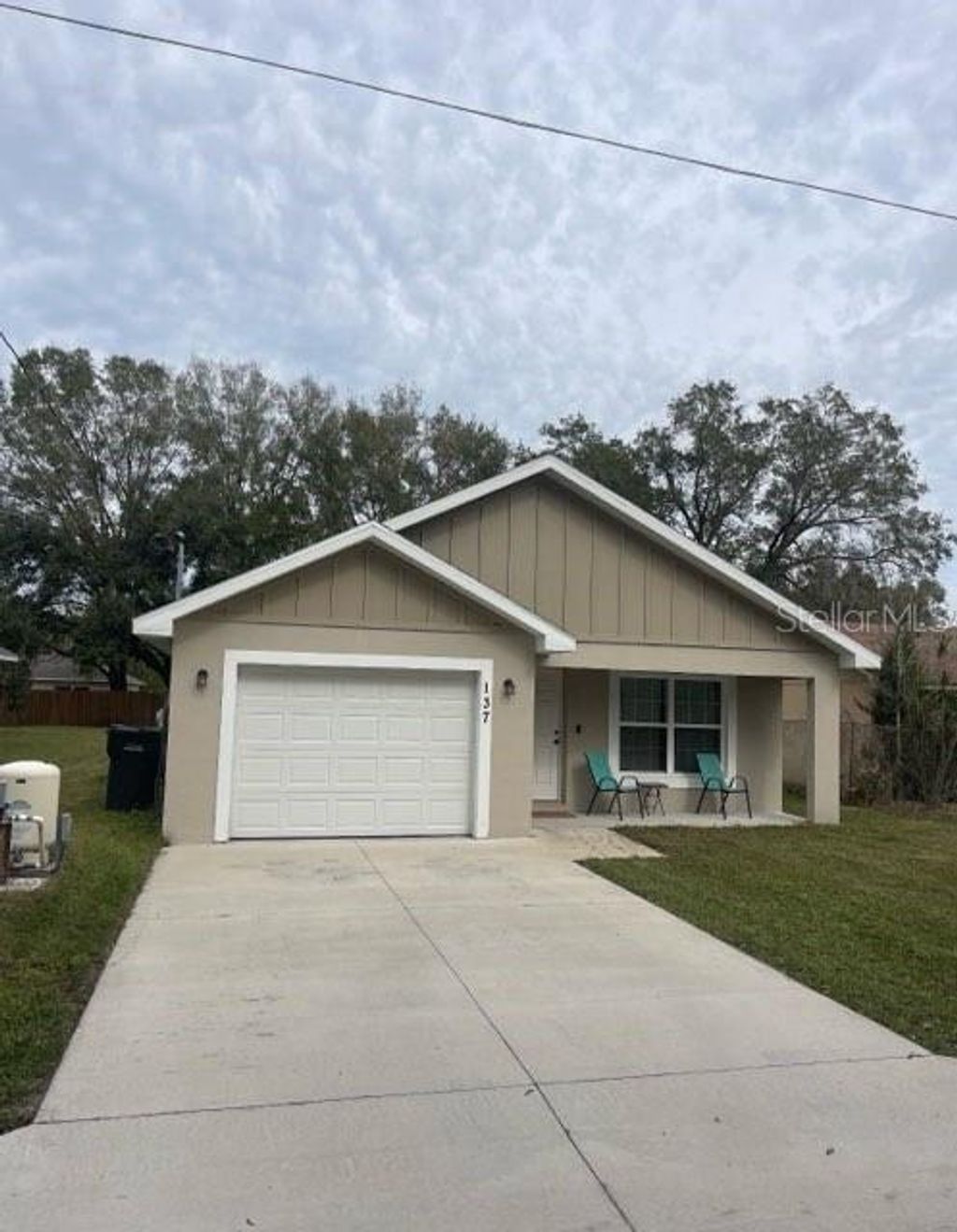 Photo of 137 Woodland Drive, Winter Haven, FL 33881 (MLS # L4958926)