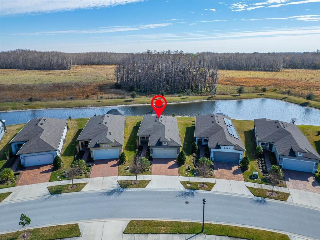 Photo of 19537 Ship Wheel Way, Land O Lakes, FL 34638 (MLS # S5118157)