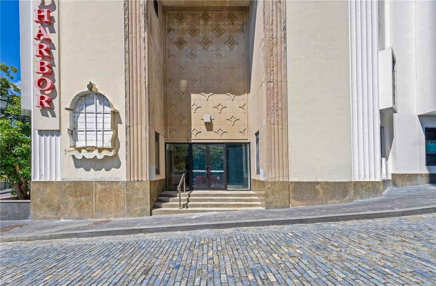 Experience a unique commercial opportunity in the heart of Old San Juan with the former Old Harbor Brewery space, a striking two-level property offering approximately 10,975 SF of versatile interiors. The ground floor spans 6,720 SF and features an open layout with two full bar areas, a spacious kitchen, and soaring 18-foot double-height ceilings that make a dramatic first impression. Upstairs, the 4,255 SF mezzanine level overlooks the main floor, making it ideal for events, dining, or lounge areas, and includes private office spaces in the rear. With its iconic location, historic charm, and flexible layout, this property is perfectly suited for a brewery, restaurant, event venue, or creative commercial concept. Situated on the bustling corner of Recinto Sur and Tizol Street, this location offers exceptional visibility and steady pedestrian traffic. Just moments away from the cruise ship port, it captures the attention of thousands of tourists entering Old San Juan daily, making it a high-impact spot for any customer-facing business. Additionally, it’s only one block away from three major public parking garages such as Dona Fela, Paseo Portuario and La Puntilla, providing convenience for both locals and visitors alike. This is a prime location for a dynamic commercial venture in one of the most visited and beloved areas of Puerto Rico.