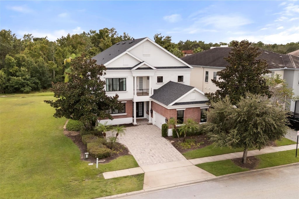 Photo of 1229 Grand Traverse Parkway, Reunion, FL 34747 (MLS # O6447377)