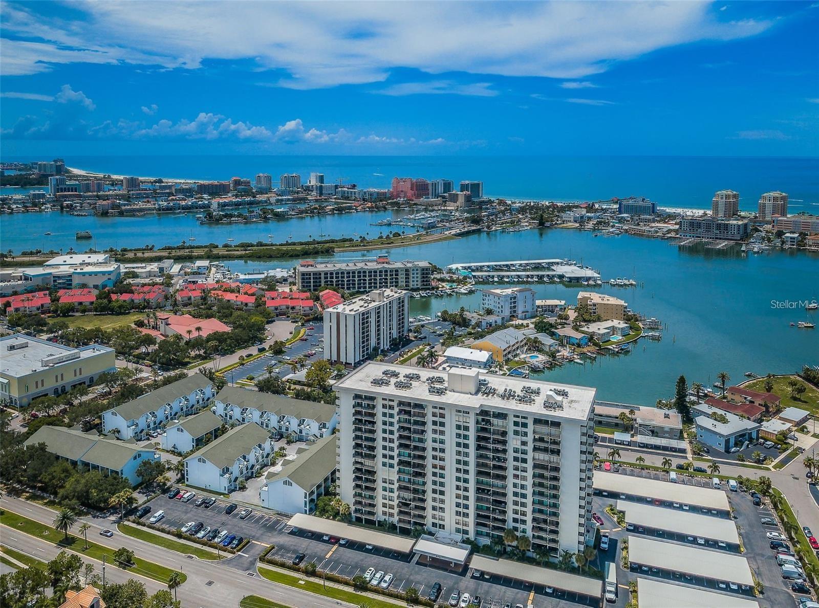 This great condo is affordably priced and has everything you want. Facing West with a large balcony you can watch sunset every day or just hang out. Located over the pool with lovely landscaping and lighting. Located on desirable Island Estates where you know your neighbors and there is a real sense of community. Lots of amenities, heated pool, large hot tub, work out center, saunas and showers in the work out rooms bathrooms, large club house in side and another on across the street for the big gatherings and large community laundry down stairs for your convenience. 503 has a washer/dryer and a new shower in the second bath. New carpet and windows in both bathrooms and a comfortable homey feel. Island Estates is close to Clearwater Beach and is a self contained community with groceries (Publix), St Brendan's, full service auto shop with gas and repairs, nail salon, coffee shop, Island Way Grill, Windward Grill, bank, quicky mart, Sushi Too and Clearwater Marine Aquarium. Come see the casual friendly community and your place in the sun. Call today!