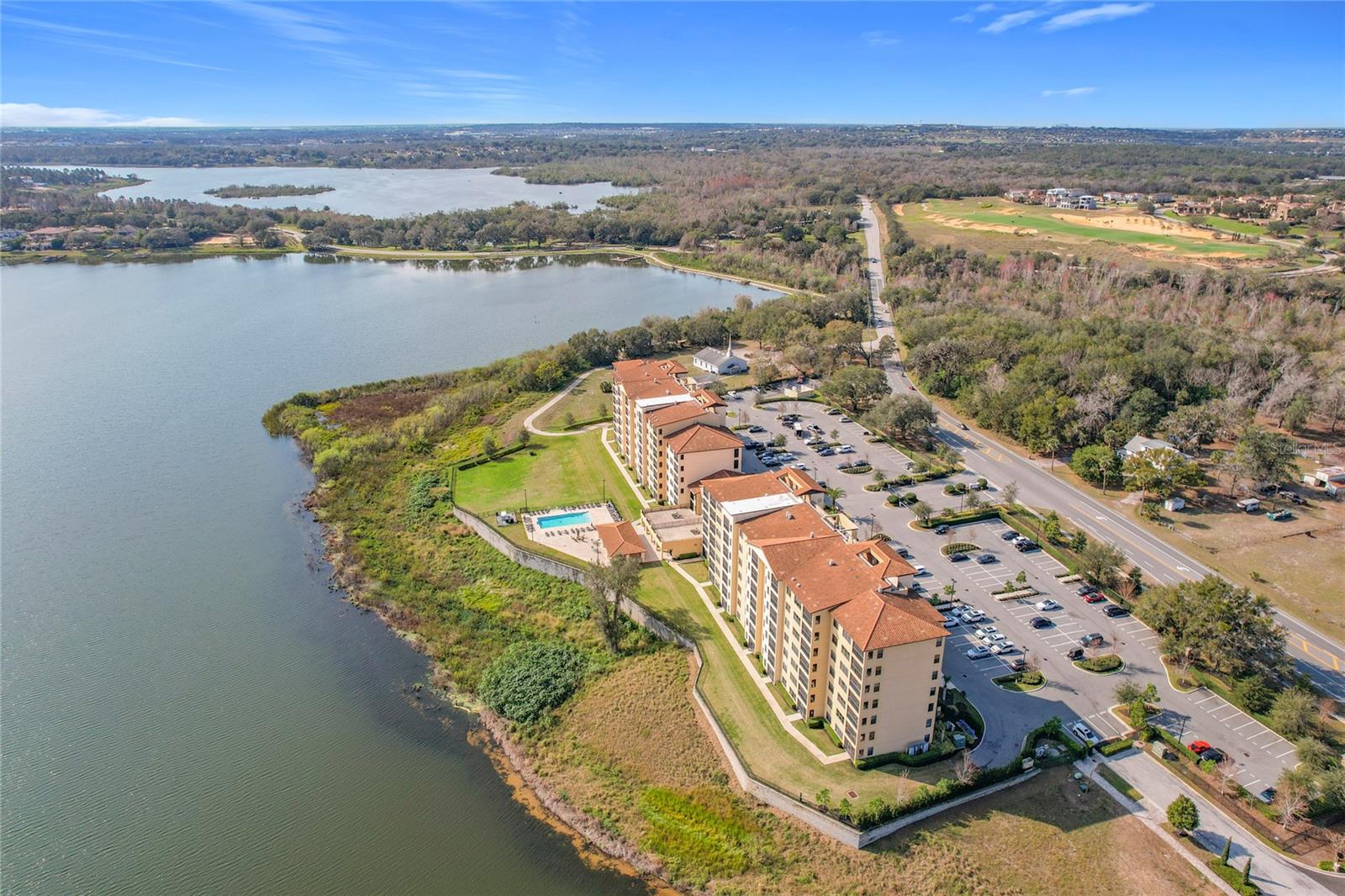 Don’t miss your chance to secure one of the rare top-floor 2-bedroom condos that perfectly blends luxury, convenience, and stunning natural beauty. This exceptional property is a true sanctuary, featuring panoramic views of gorgeous Lake Siena that will take your breath away every morning as the sun rises over the water.
As you enter, you’ll find a beautifully designed kitchen that serves as the heart of the home. With modern finishes and a stylish island, it seamlessly flows into a bright and airy dining and family room. Step through sliding doors to your private screened-in balcony, an idyllic space for relaxation or entertaining while soaking in those mesmerizing lake views.
The spacious primary suite is your personal retreat, complete with a generous walk-in closet and a spa-like en-suite bathroom boasting a lavish walk-in shower and a separate soaking tub—your ideal escape after a long day.
Embrace an unparalleled lifestyle with resort-style amenities, including a heated lakefront pool and a covered patio perfect for grilling. The inviting condo lobby adds to your living experience, featuring a conference room, a state-of-the-art 24-hour fitness center, and a versatile space for hosting special occasions.
Location is paramount! Enjoy effortless access to the vibrant shops and restaurants of downtown Winter Garden, as well as quick connections to major highways: 408, 429, and the Florida Turnpike, making your commute a breeze.
This is more than just a home; it’s a lifestyle waiting for you to embrace. Call today to schedule your private showing and take the first step towards owning this remarkable top-floor condo with panoramic views of stunning Lake Siena! Act fast—opportunities like this don’t last long!