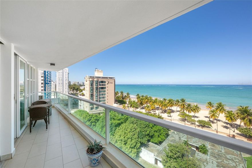 Own a piece of prime real estate at this ocean front condo in Isla Verde. This 1,800 sq. ft. 2 bedroom / 2.5 bath residence offers modern design with gorgeous views. The open-concept layout is ideal for hosting gatherings or enjoying quiet mornings with expansive ocean views and abundant natural light. Every detail was thoughtfully selected to create a home that feels both luxurious and inviting, from the high-end finishes to the intuitive smart-home features that enhance daily comfort. Sold fully furnished, move right in. 
The renovated kitchen serves as the centerpiece of the home, blending style and functionality with its quartzite countertops, sleek cabinetry, and top-of-the-line GE Monogram appliances. Whether preparing a casual breakfast or entertaining guests overlooking the Atlantic Ocean, the induction cooktop, beverage/wine refrigerator, and spacious layout enhance every culinary experience. Adjacent living and dining spaces effortlessly accommodate both intimate evenings and larger gatherings, all set against the backdrop of the building’s coveted beachfront location.
The primary suite is a true sanctuary, designed to offer privacy and tranquility. Its expansive en-suite bathroom features a double vanity, smart toilet, and modern fixtures that create a spa-like atmosphere. A generous walk-in closet provides ample storage and thoughtful organization. Secondary spaces - including the guest bedroom and additional bathrooms - maintain the home’s high standard of design, ensuring comfort and style for both residents and visitors.
Beyond the walls of the residence, the condominium’s beachfront location offers immediate access to San Juan’s pristine shores and vibrant lifestyle. Here, you can enjoy morning strolls along the coast, effortless access to dining and entertainment, and the serenity of oceanfront living - all from the comfort of a beautifully curated home that captures the essence of modern luxury in Puerto Rico. Amenities for this 11-story building include a pristine pool and fully equipped fitness center. 
Ocean View 903 and apartment Ocean View 904 next door, are both currently on the market separately. However, this is also a rare opportunity to acquire side-by-side ocean front properties together allowing the possibility for roughly 3,600 sq ft of living space and 5 bedrooms and 6 bathrooms. Call for more information.