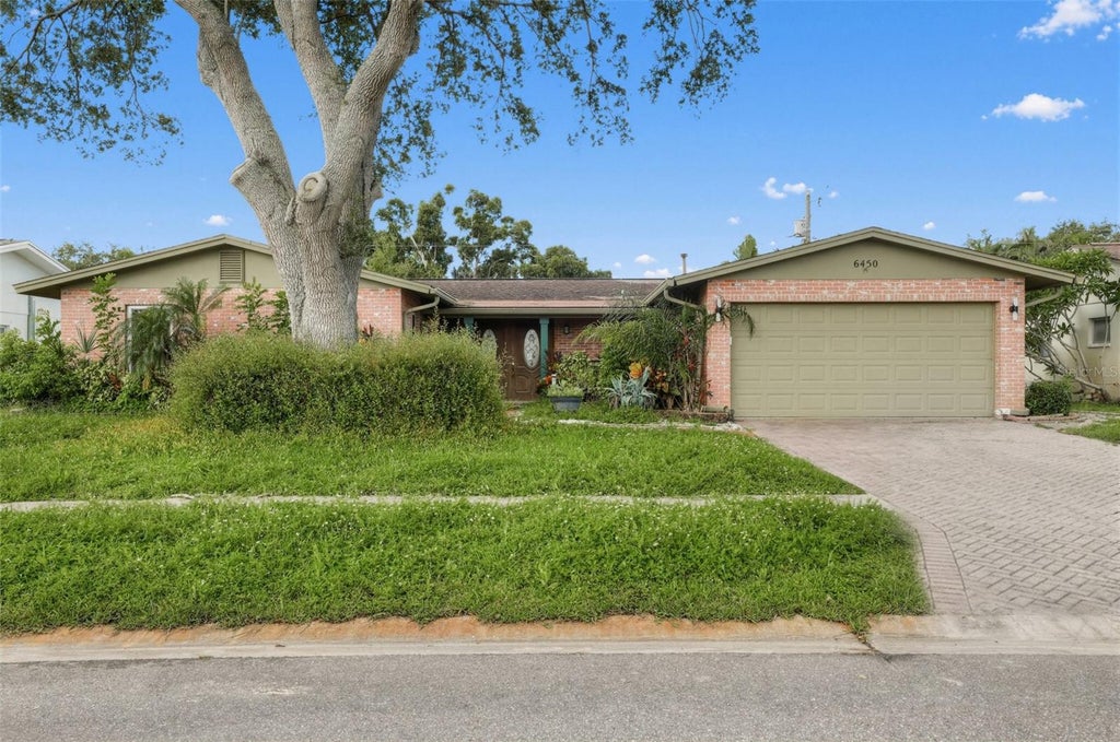 Photo of 6450 31st Terrace N, St Petersburg, FL 33710 (MLS # A4703097)