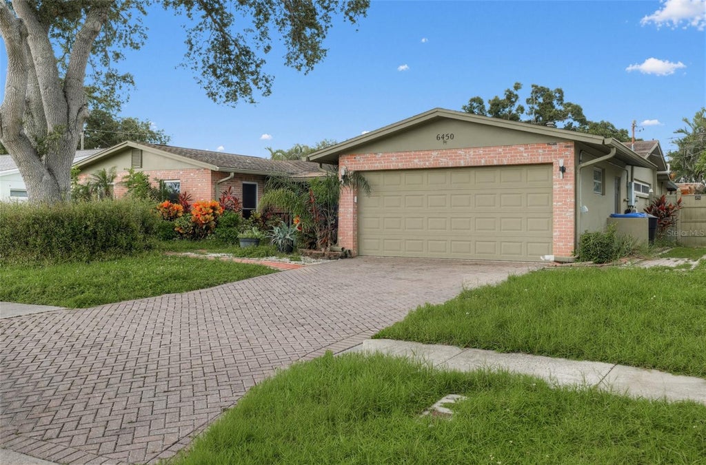 Photo of 6450 31st Terrace N, St Petersburg, FL 33710 (MLS # A4703097)