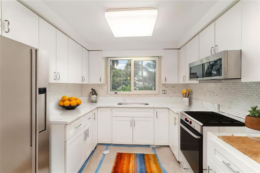 Photo of 509 Spanish Drive N, Longboat Key, FL 34228 (MLS # A4661986)