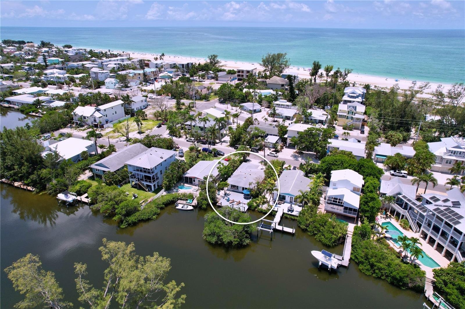 A truly charming North End canal home! This cozy property is ideally located just two short blocks from the beach, providing incredibly convenient access to the beautiful beaches of Anna Maria Island.
One of the standout features of this lovely home is its expansive deck, which offers a fantastic view overlooking the water. It also includes a private boat dock with water and electric and boat lift, making it perfect for anyone who enjoys spending time out on the water. You'll appreciate the sense of privacy provided by the tropical landscaping, and the serene water views where manatees are often spotted. The home itself features two bedrooms and two bathrooms both with walk in closets and ensuite bathrooms, an open floor plan with updated kitchen and bathrooms, a screened lanai, and a single-car garage. Upgrades include impact windows and sliders installed in 2022. You'll also find the Florida-friendly landscape and turf make for easy maintenance, which is a wonderful benefit.
This home has been lovingly enjoyed by the property owner and is not currently a vacation rental. However, it does allow the flexibility for short-term rentals, including weekly or less, which could be an excellent opportunity. Being offered furnished and ready for you to enjoy!
We would be absolutely delighted to arrange a private showing for you to experience this charming home firsthand.