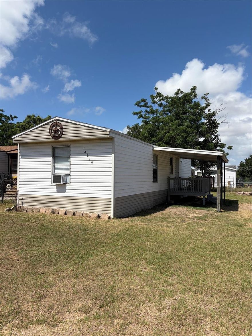 Nice two bedroom ~ one bath home located in Montverde for lease.  Nice spacious feel as you enter you will notice the open floor plan.  The kitchen is open to the family room.  Kitchen has a refrigerator and range.  Laminate flooring throughout and three window units evenly spaced for nice air flow.  Enjoy time spent on the front covered porch after a long day.  Completely fenced yard however NOT PETS allowed!  Need storage...... there is a shed in the back yard for any additional storage needed.