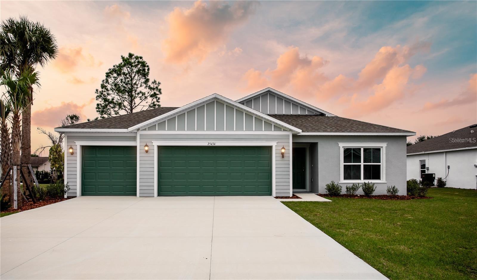 Short Sale. ***New construction, no wait, move in ready!*** Elevate your lifestyle with the opulence of the Sanibel II floorplan presented by Carpenter Homes a masterpiece within the Florida Living Series, certified by the Florida Green Building Coalition (FGBC). This one-story residence features 4 bedroom and 2 full bathrooms! As you enter, a beautiful kitchen welcomes you, with an expansive, oversized island that seamlessly flows into the living and dining area, the finesse of soft-close 36" cabinets and upgraded Blanco Matrix quartz countertops. Pristine SoHo 3x6 subway tile kitchen backsplash. An upgraded plumbing package featuring a Moen Sleek spot resistant stainless steel kitchen faucet and garbage disposal. Equipped with sleek stainless steel energy efficient appliances. This home exudes sophistication with a vaulted ceiling that unveils a spacious Florida Room creating an indoor-outdoor haven. Additionally, Carpenter Homes provides an upgraded brushed nickel lighting package including pendants over the kitchen island, and vanity fixtures in both bathrooms, gorgeously accenting the overall lighting design. Ceiling fans, complete with brushed pewter finish in each bedroom as well as the great room to help circulate air flow and keep you cool in the Florida weather. Complimenting the expansive living area is Glen Arbor 6x26 ceramic plank flooring. The Owner's suite is a sanctuary of indulgence, showcasing dual sinks, impeccably tiled Magnisi 8x12 white walls in the shower, and a generously sized walk-in closet. The home boasts Magnisi 8x12 white upgraded tiled walls in in the second bath/shower, a Blanco Matrix quartz vanity, and Moen Genta LX chrome faucets and shower/tub trim kits. The ampleness of this home continues with a utility room, and cutting-edge additions such as energy-efficient R-4.1 insulation on concrete exterior walls, Taexx tubes for pest control, and fabric hurricane shutters for every window. The meticulously landscaped yard is complemented by a state-of-the-art irrigation system with a rain sensor to help maximize efficiency. The expansive 3-car garage, complete with two garage door openers and four remotes, not only provides ample space for your everyday needs but also ensures the utmost convenience and versatility for all your storage and parking requirements. Step into a world where extravagance meets eco-conscious living your luxurious home awaits, a testament to timeless elegance and modern sustainability. Available to view any time.