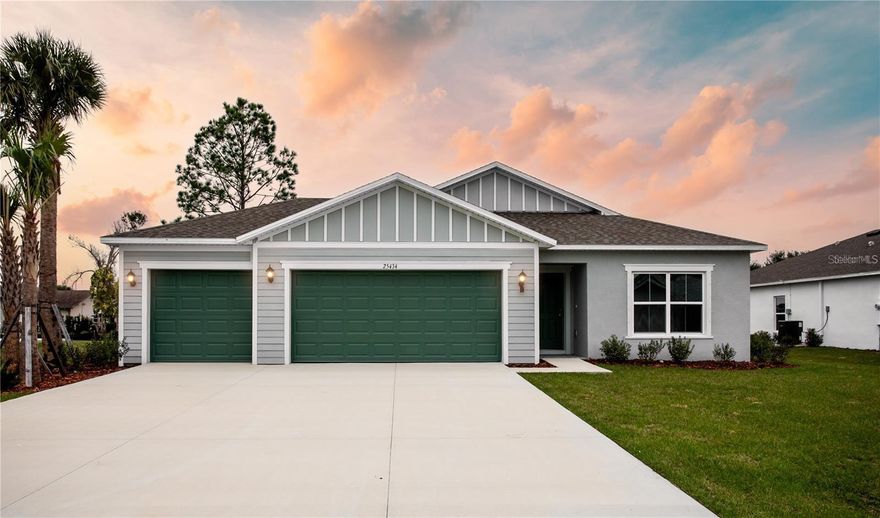 Short Sale. ***New construction, no wait, move in ready!*** Elevate your lifestyle with the opulence of the Sanibel II floorplan presented by Carpenter Homes a masterpiece within the Florida Living Series, certified by the Florida Green Building Coalition (FGBC). This one-story residence features 4 bedroom and 2 full bathrooms! As you enter, a beautiful kitchen welcomes you, with an expansive, oversized island that seamlessly flows into the living and dining area, the finesse of soft-close 36" cabinets and upgraded Blanco Matrix quartz countertops. Pristine SoHo 3x6 subway tile kitchen backsplash. An upgraded plumbing package featuring a Moen Sleek spot resistant stainless steel kitchen faucet and garbage disposal. Equipped with sleek stainless steel energy efficient appliances. This home exudes sophistication with a vaulted ceiling that unveils a spacious Florida Room creating an indoor-outdoor haven. Additionally, Carpenter Homes provides an upgraded brushed nickel lighting package including pendants over the kitchen island, and vanity fixtures in both bathrooms, gorgeously accenting the overall lighting design. Ceiling fans, complete with brushed pewter finish in each bedroom as well as the great room to help circulate air flow and keep you cool in the Florida weather. Complimenting the expansive living area is Glen Arbor 6x26 ceramic plank flooring. The Owner's suite is a sanctuary of indulgence, showcasing dual sinks, impeccably tiled Magnisi 8x12 white walls in the shower, and a generously sized walk-in closet. The home boasts Magnisi 8x12 white upgraded tiled walls in in the second bath/shower, a Blanco Matrix quartz vanity, and Moen Genta LX chrome faucets and shower/tub trim kits. The ampleness of this home continues with a utility room, and cutting-edge additions such as energy-efficient R-4.1 insulation on concrete exterior walls, Taexx tubes for pest control, and fabric hurricane shutters for every window. The meticulously landscaped yard is complemented by a state-of-the-art irrigation system with a rain sensor to help maximize efficiency. The expansive 3-car garage, complete with two garage door openers and four remotes, not only provides ample space for your everyday needs but also ensures the utmost convenience and versatility for all your storage and parking requirements. Step into a world where extravagance meets eco-conscious living your luxurious home awaits, a testament to timeless elegance and modern sustainability. Available to view any time.