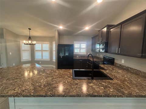 Tiny photo for 9155 SE 47th Ct Road, Ocala, FL 34480 (MLS # OM727391)